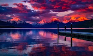 Dock Under Cloudy Sky in Front of Mountain Dock Under Cloudy Sky in Front of Mountain